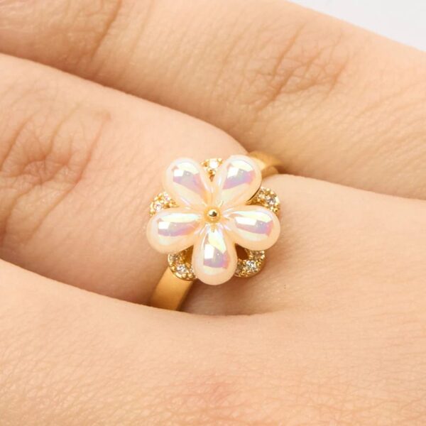 Anillo Flor perla giratoria
